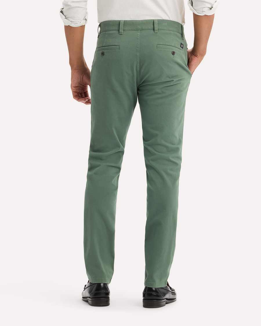 View of model wearing Duck Green Ultimate Chinos, Skinny Fit.