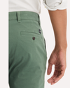View of model wearing Duck Green Ultimate Chinos, Skinny Fit.