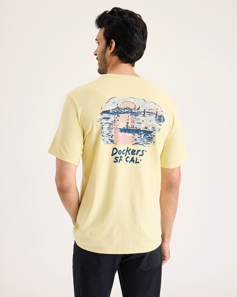 Back view of model wearing Dusty Yellow Logo Tee, Slim Fit.