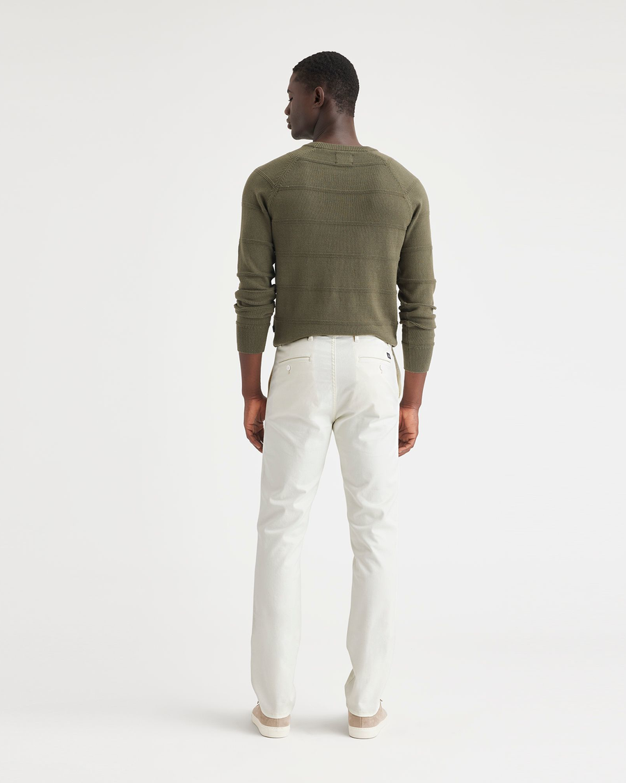 Back view of model wearing Egret Men's Slim Fit Original Chino Pants.