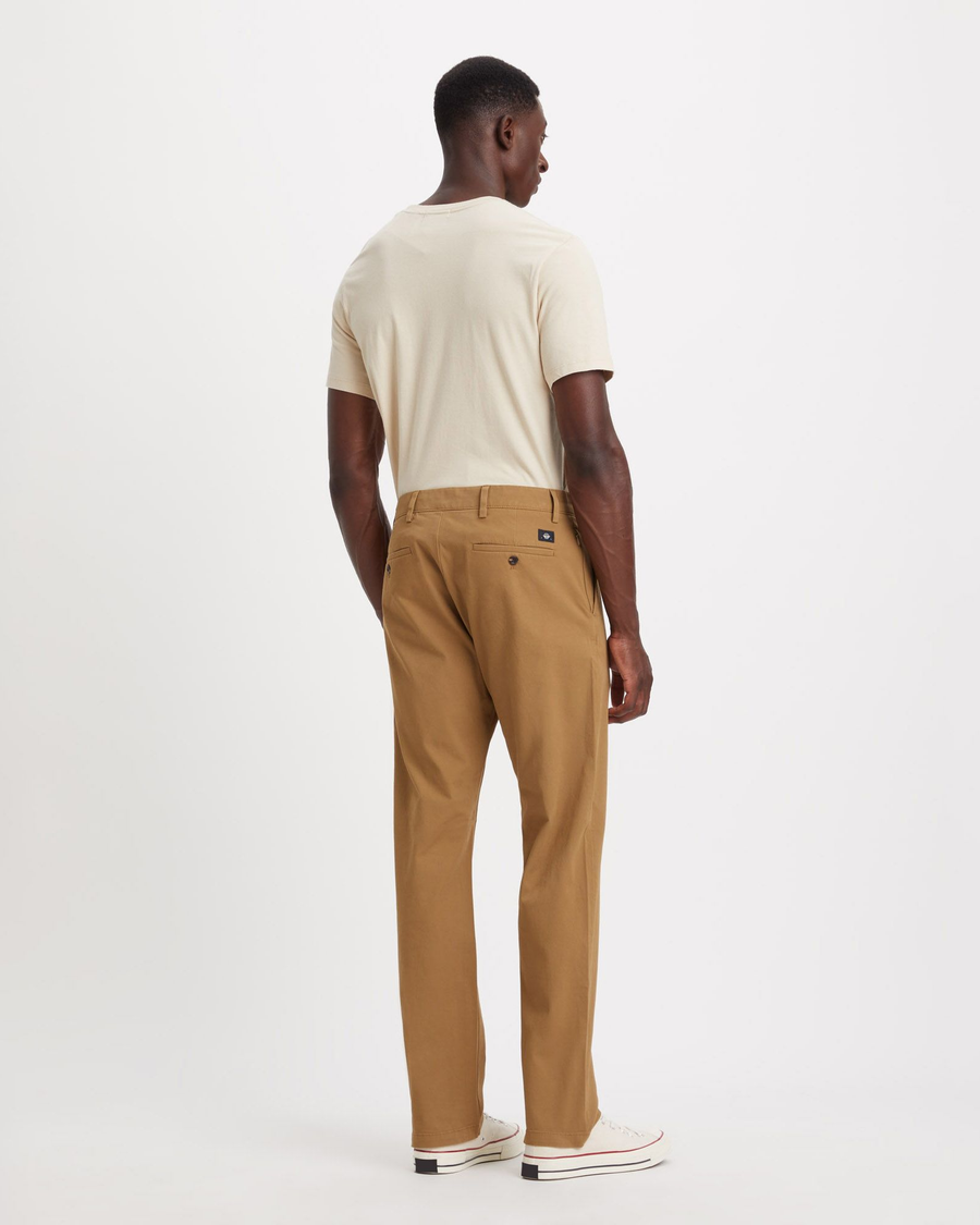 Back view of model wearing Ermine Men's Straight Fit Smart 360 Flex Alpha Chino Pants.