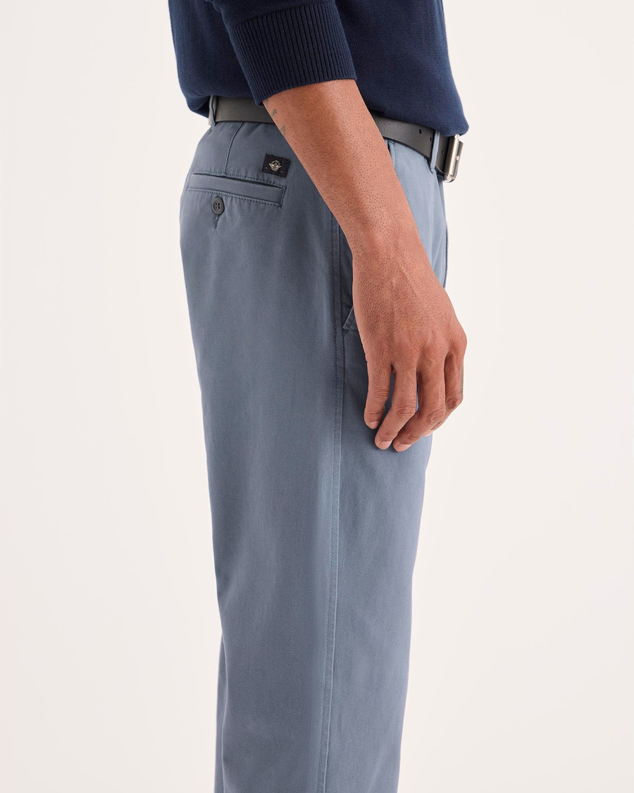 Side view of model wearing Folkstone Gray Ultimate Chino Pants with Smart 360 Flex™, Slim Fit.