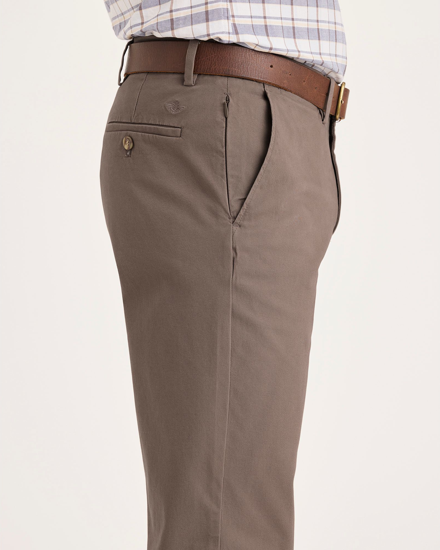 Side view of model wearing Fossil Crafted Khaki Pants, Slim Fit.