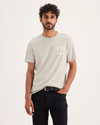 Front view of model wearing Grit Graphic Tee, Slim Fit.