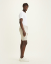 Side view of model wearing Grit Men's Supreme Flex Modern Chino Short.