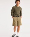 View of model wearing Harvest Gold Alpha 8" Shorts.