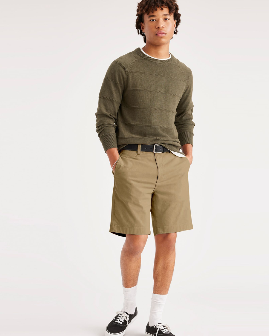 View of model wearing Harvest Gold Alpha 8" Shorts.