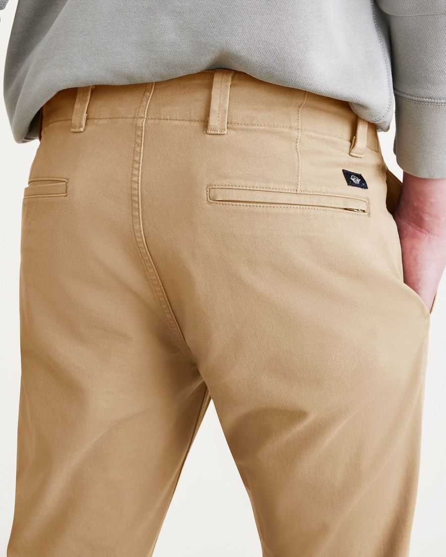 View of model wearing Harvest Gold Alpha Chino Pants, Skinny Fit.