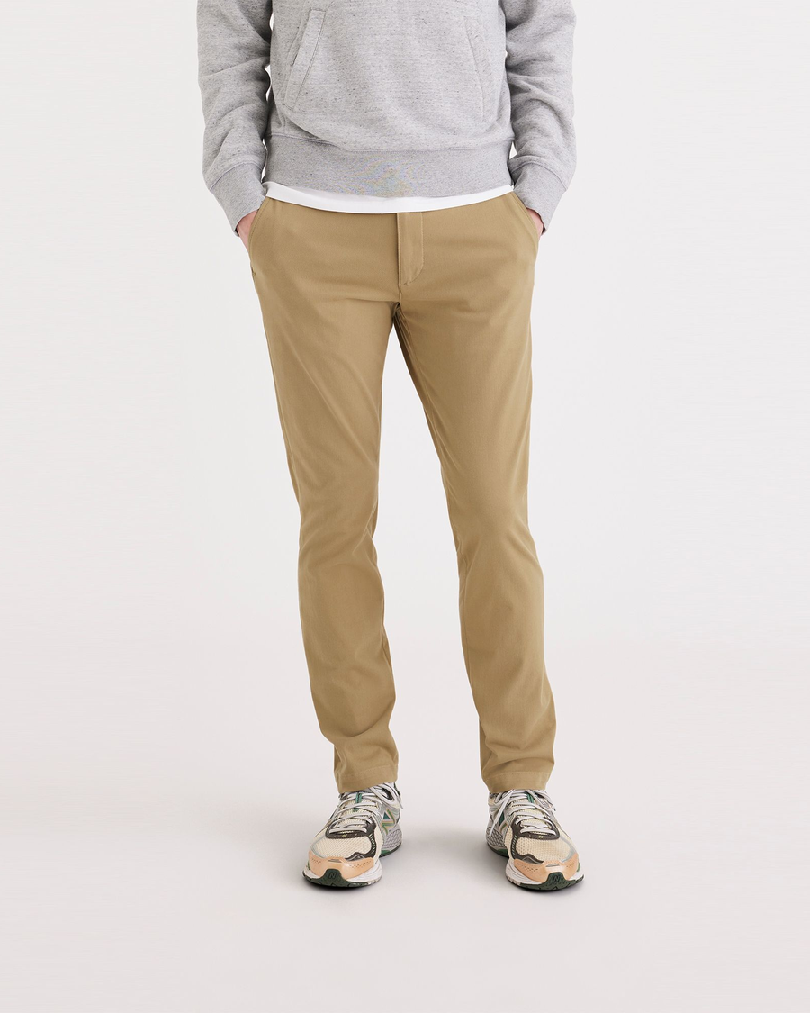 Front view of model wearing Harvest Gold Go Chino, Skinny Fit.