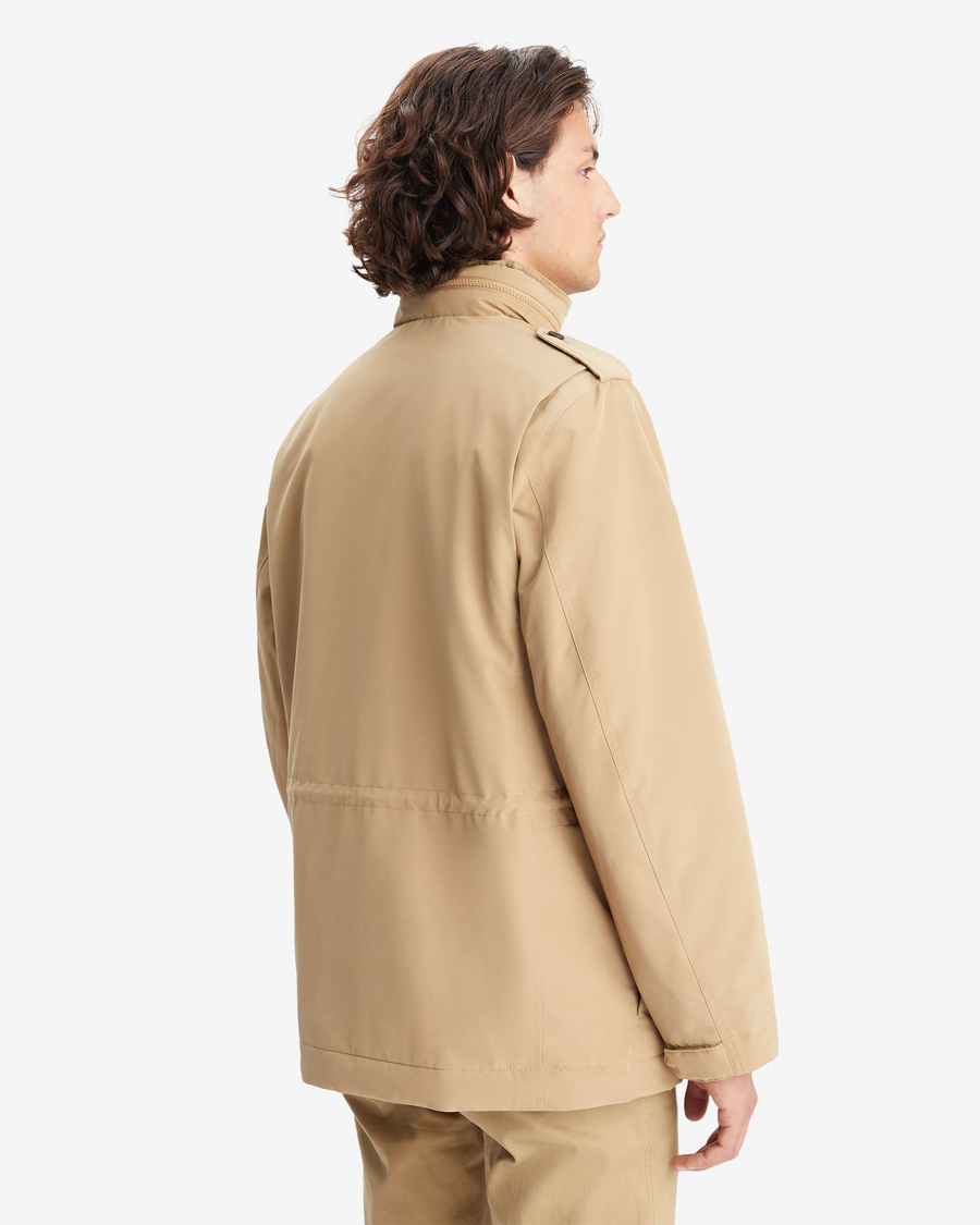 Back view of model wearing Harvest Gold Men's Field Jacket.