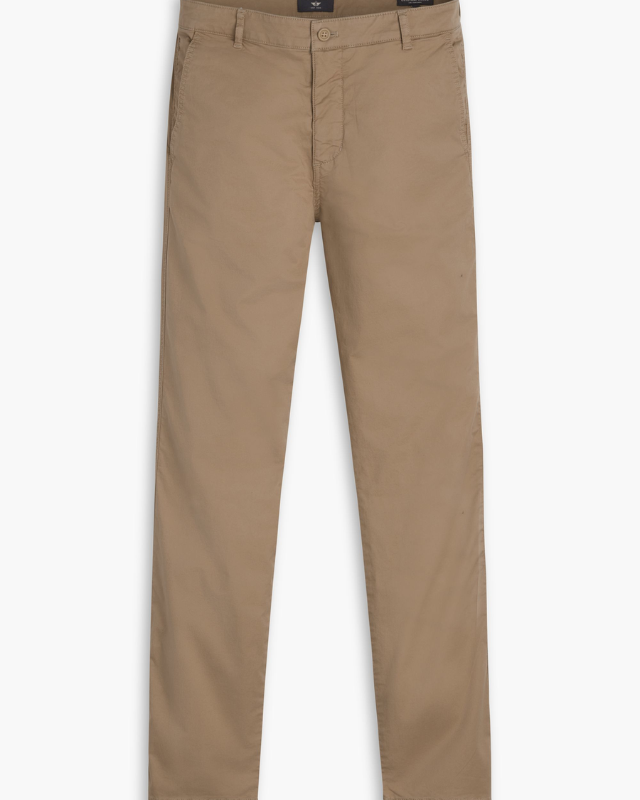 View of model wearing Harvest Gold Men's Slim Fit Original Chino Pants.