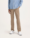 Front view of model wearing Harvest Gold Men's Slim Fit Original Chino Pants.