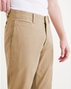 View of model wearing Harvest Gold Men's Slim Fit Smart 360 Flex California Chino Pants.