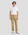 Front view of model wearing Harvest Gold Men's Straight Fit Original Chino Pants.