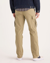 Back view of model wearing Harvest Gold Utility Cargo Pant, Straight Fit.