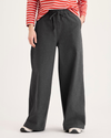 Front view of model wearing Heather Gray Drawstring Pants.