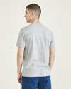 Back view of model wearing Heather Grey Men's Original Tee.