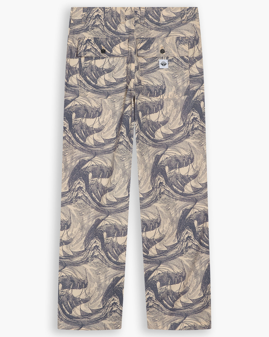 View of model wearing Ichabod Buttercream Eighty-Six Utility Pants, Loose Fit.