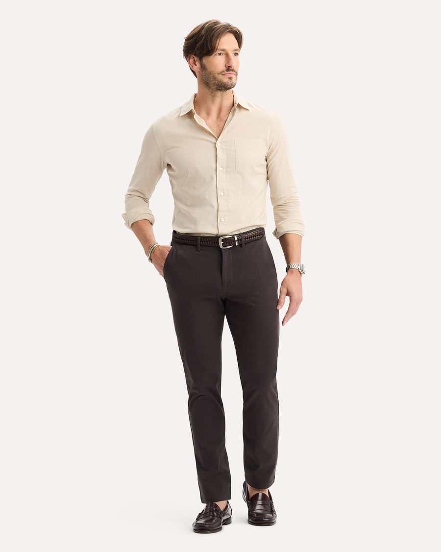 View of model wearing Licorice Crafted Khaki Pants, Slim Fit.