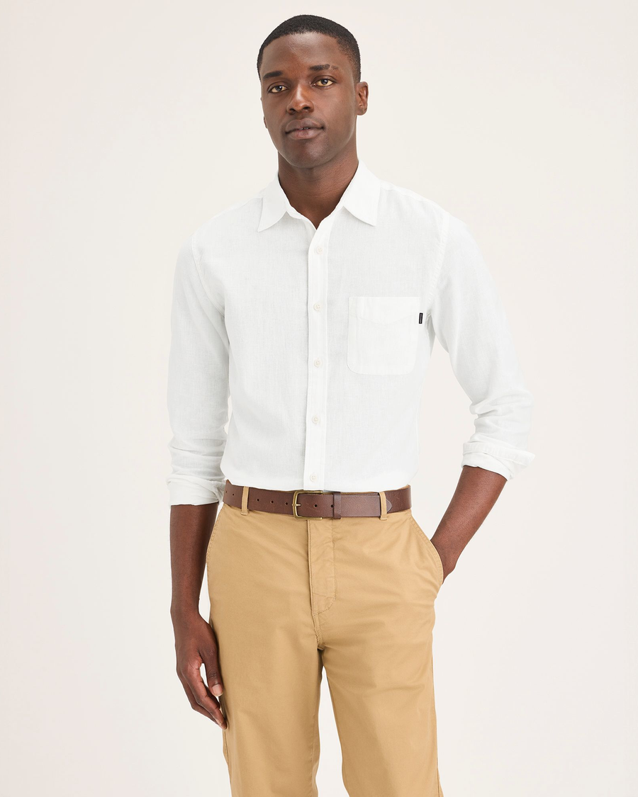 Front view of model wearing Light White Rigid Men's Slim Fit Icon Button Up Shirt.