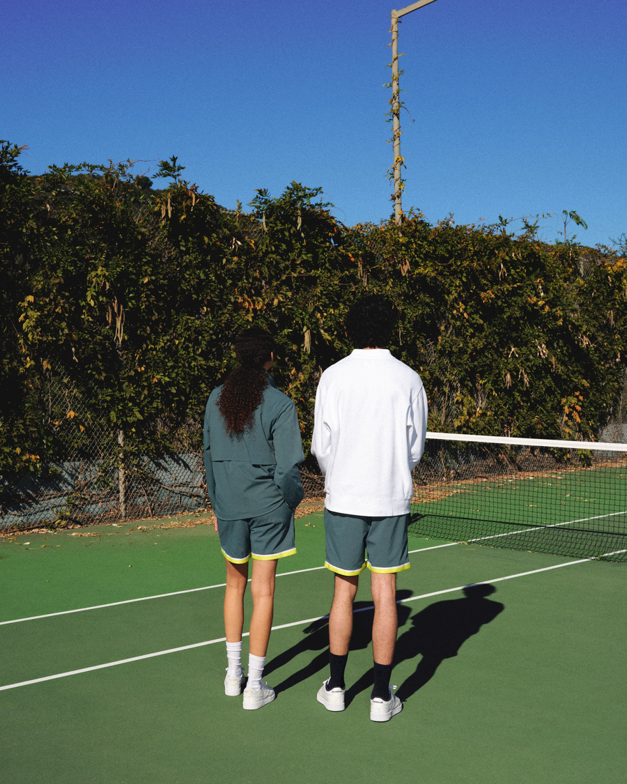 View of model wearing Lucent White Racquet Club Collared Sweatshirt, Relaxed Fit.