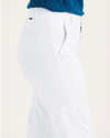 Side view of model wearing Lucent White Women's Slim Fit Weekend Chino Pants.