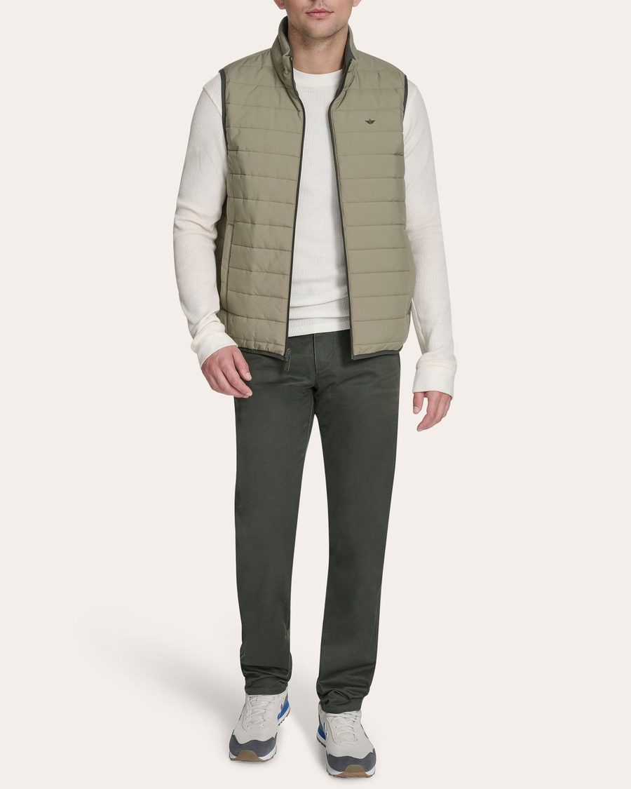 View of model wearing Mermaid Reversible Puffer Vest.