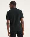 Back view of model wearing Mineral Black Men's Slim Fit Rib Collar Polo.