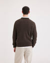 Back view of model wearing Molasses Men's Regular Fit Crewneck Sweater.