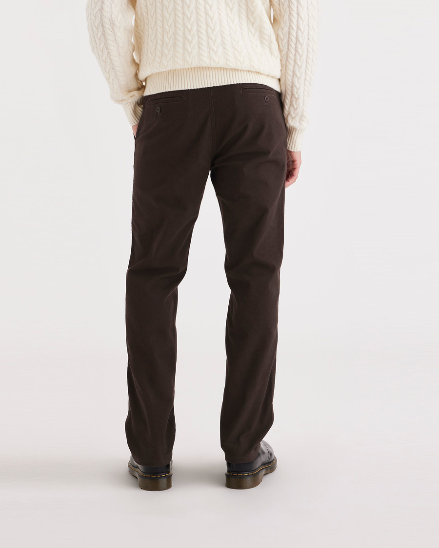 Back view of model wearing Mole Men's Slim Fit Original Chino Pants.