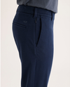 Side view of model wearing Navy Blazer Go Activeflex Chino, Slim Fit.