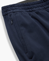 View of model wearing Navy Blazer Go Activeflex Pull-On Pant, Slim Fit.