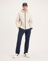 View of model wearing Navy Blazer Go Activeflex Pull-On Pant, Slim Fit.