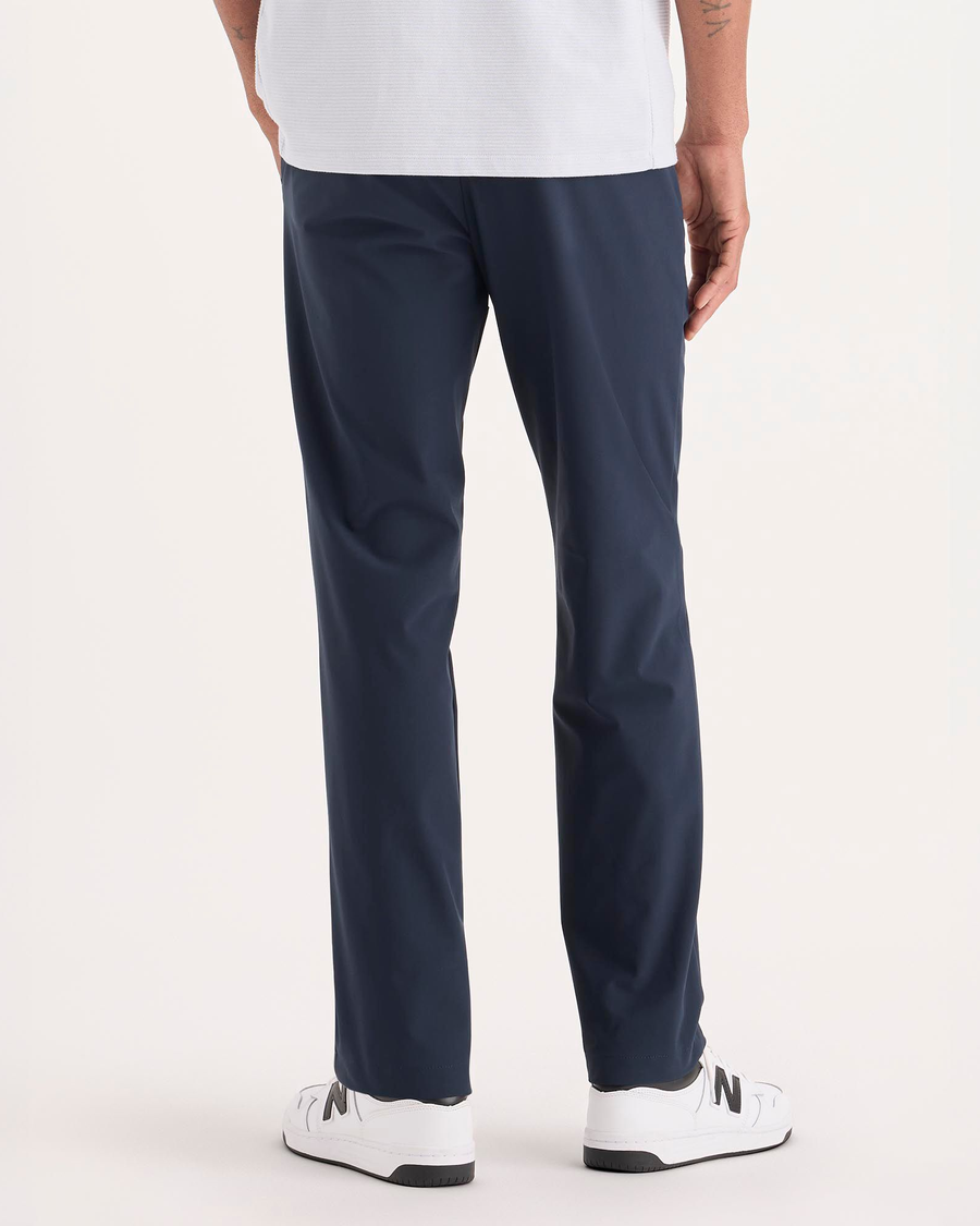 Back view of model wearing Navy Blazer Go Chino, Slim Fit with Airweave.
