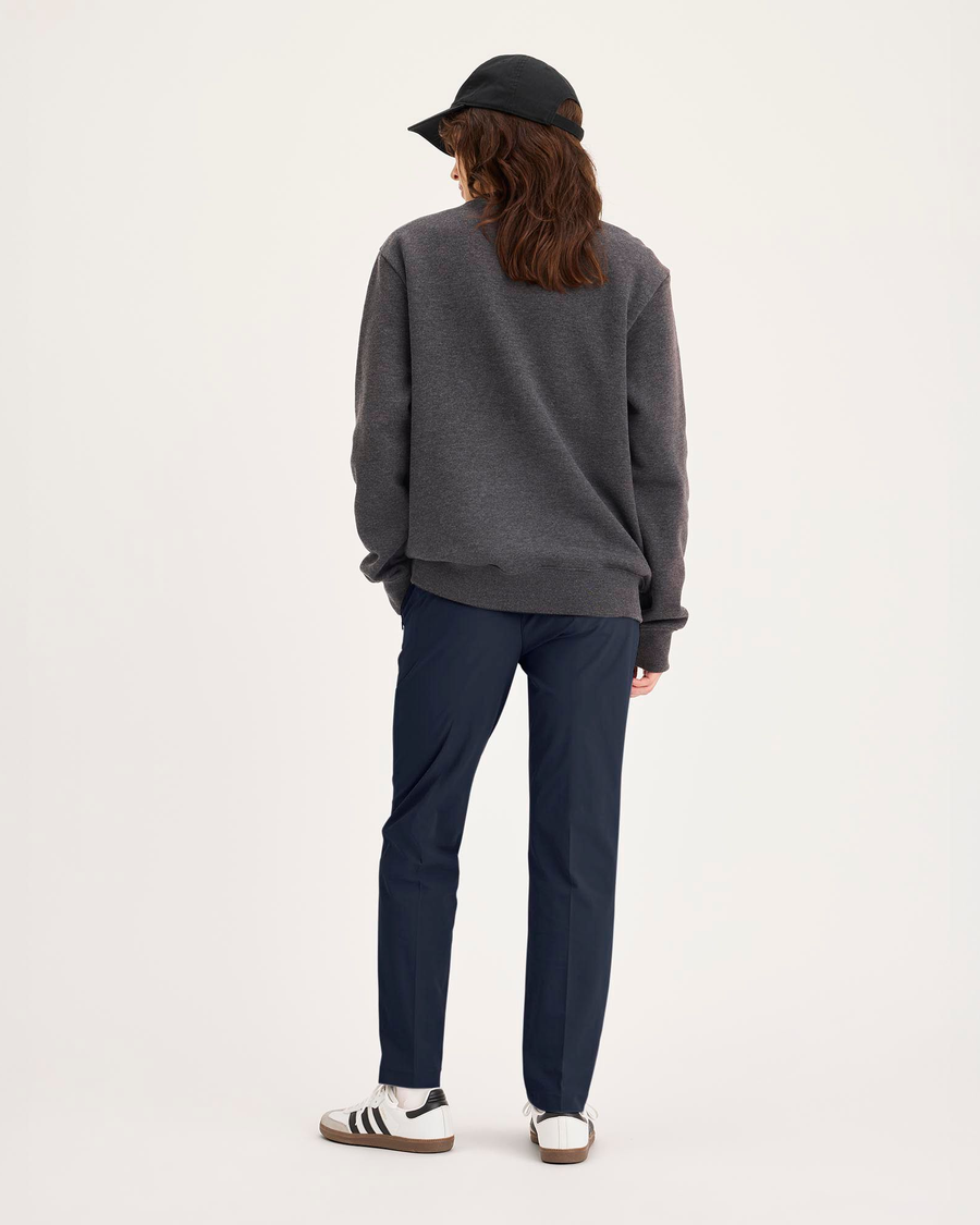 Back view of model wearing Navy Blazer Go Pant, Slim Fit with Airweave.