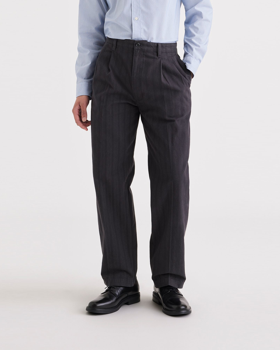 Front view of model wearing Navy Blazer Men's Loose Fit Pleated Original Chino Pants.