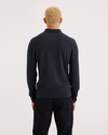 Back view of model wearing Navy Blazer Men's Regular Fit Polo Sweater.