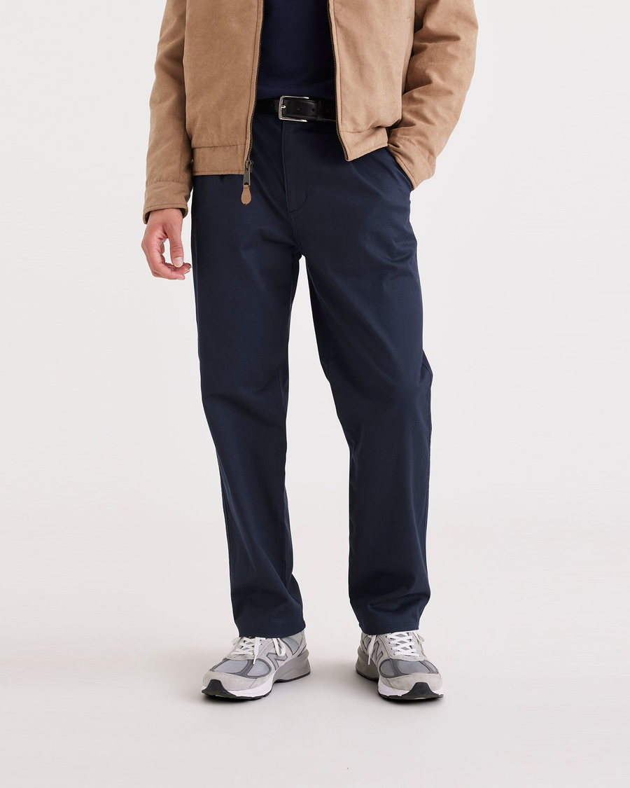 Front view of model wearing Navy Blazer Men's Relaxed Tapered Fit Original Chino Pants.