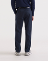 Back view of model wearing Navy Blazer Original Chinos, Relaxed Tapered Fit.