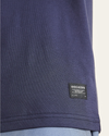 View of model wearing Navy Blazer Original Tee, Slim Fit.