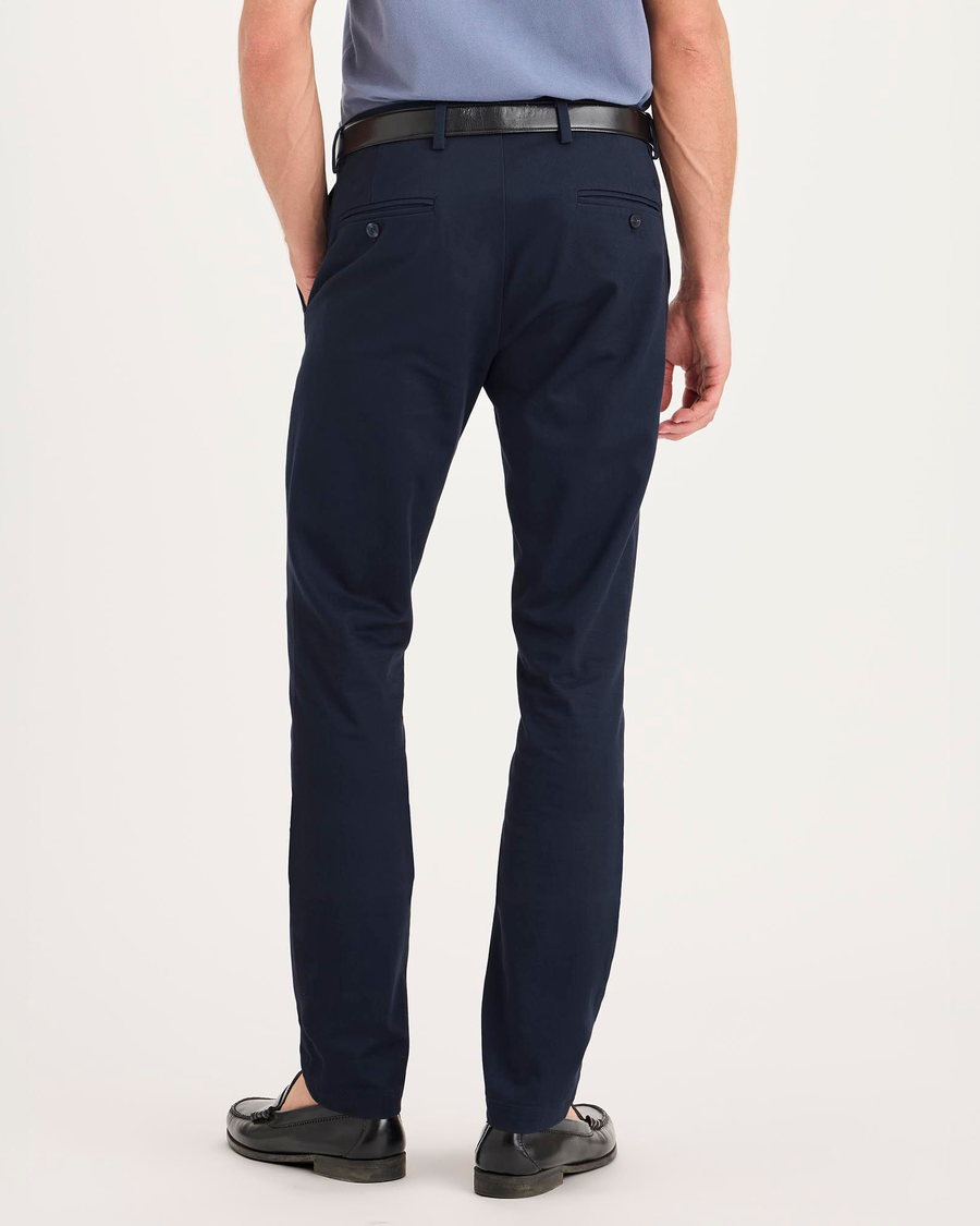 Back view of model wearing Navy Blazer Signature Iron Free Khakis, Skinny Fit with Stain Defender®.