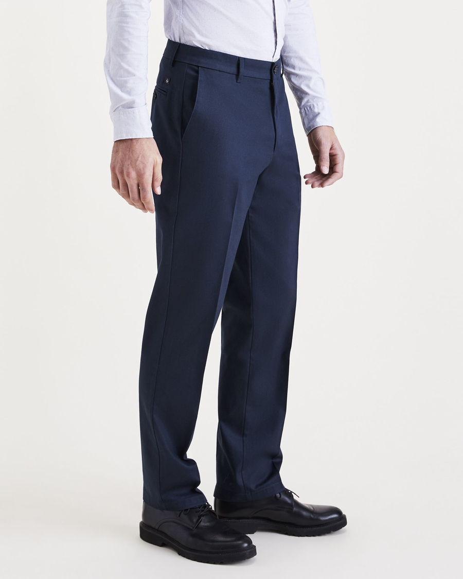Side view of model wearing Navy Blazer Signature Iron Free Khakis, Straight Fit with Stain Defender®.