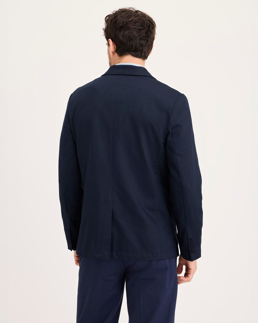 Back view of model wearing Navy Blazer Signature Refined Blazer, Regular Fit.