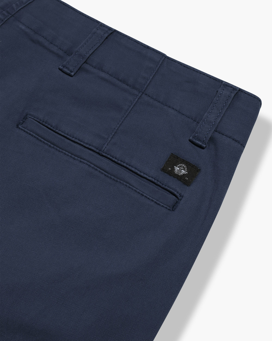 View of model wearing Navy Blazer Utility Cargo Pant, Straight Fit.