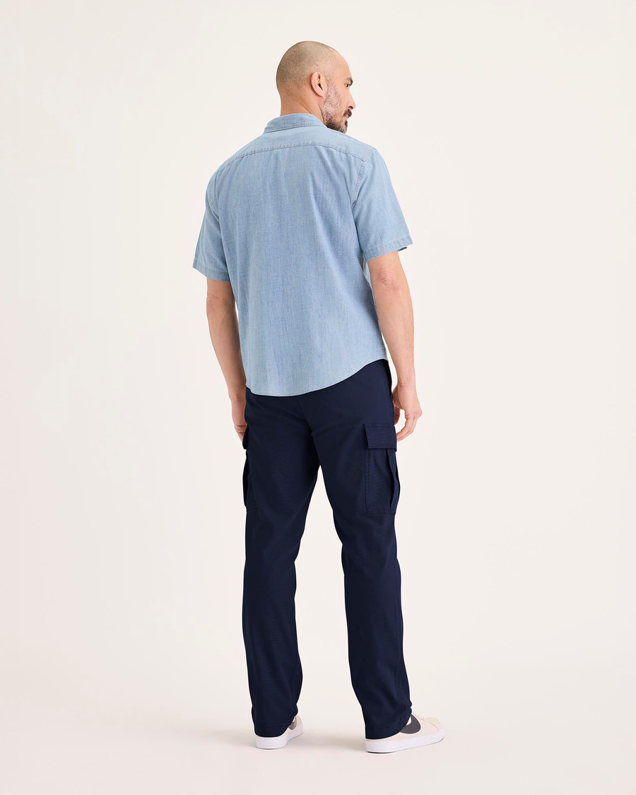 Back view of model wearing Navy Blazer Utility Cargo Pant, Straight Fit.