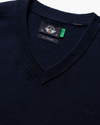 View of model wearing Navy Blazer V Neck Sweater.
