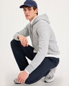 View of model wearing Navy Go Airweave Chino, Straight Fit.