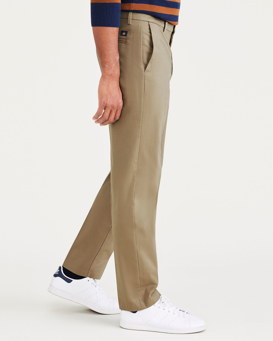 Side view of model wearing New British Khaki Signature Iron Free Khakis, Creased, Straight Fit with Stain Defender®.