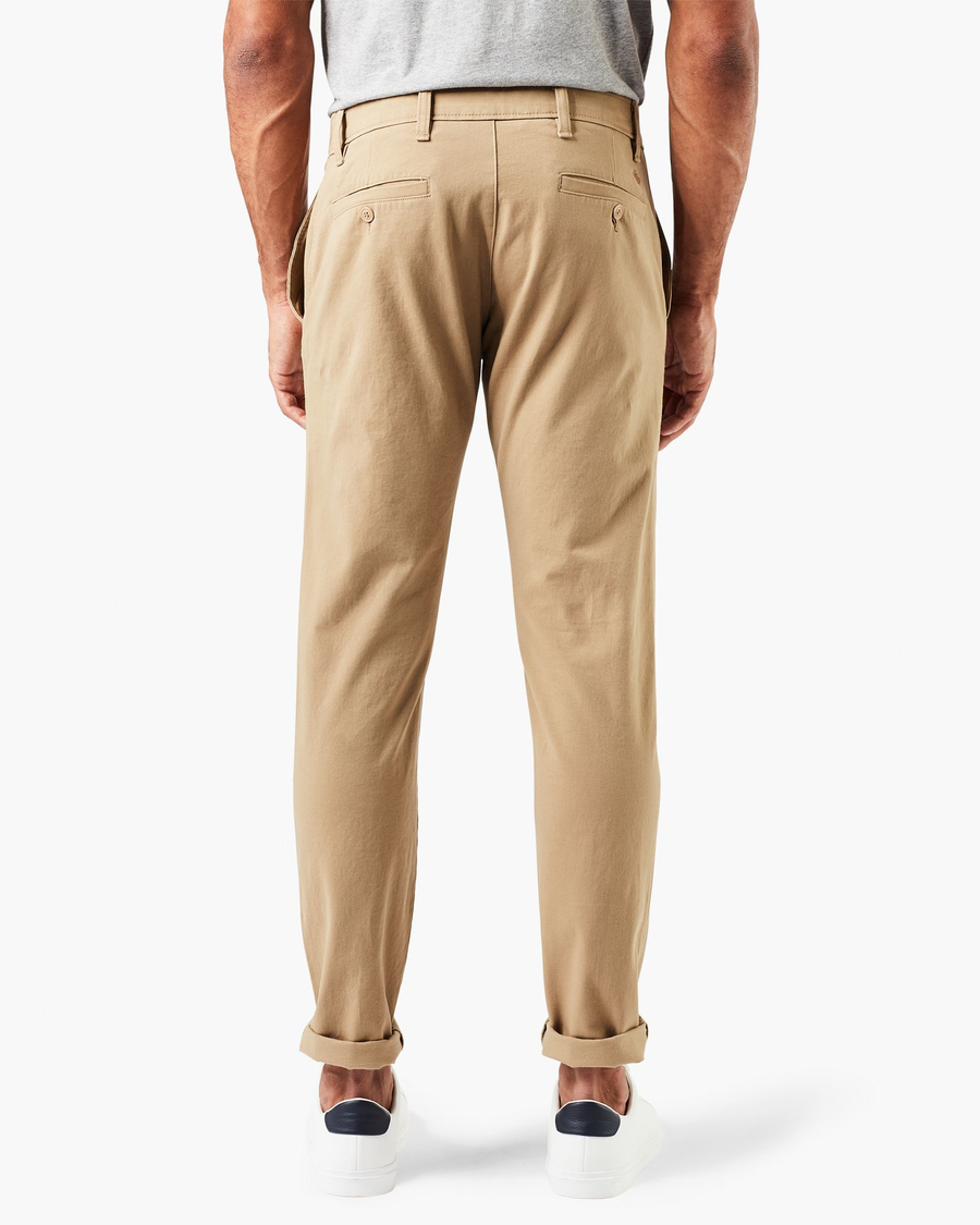 Back view of model wearing New British Khaki Ultimate Chinos, Skinny Fit.