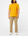 Front view of model wearing New British Khaki Ultimate Chinos, Straight Fit.